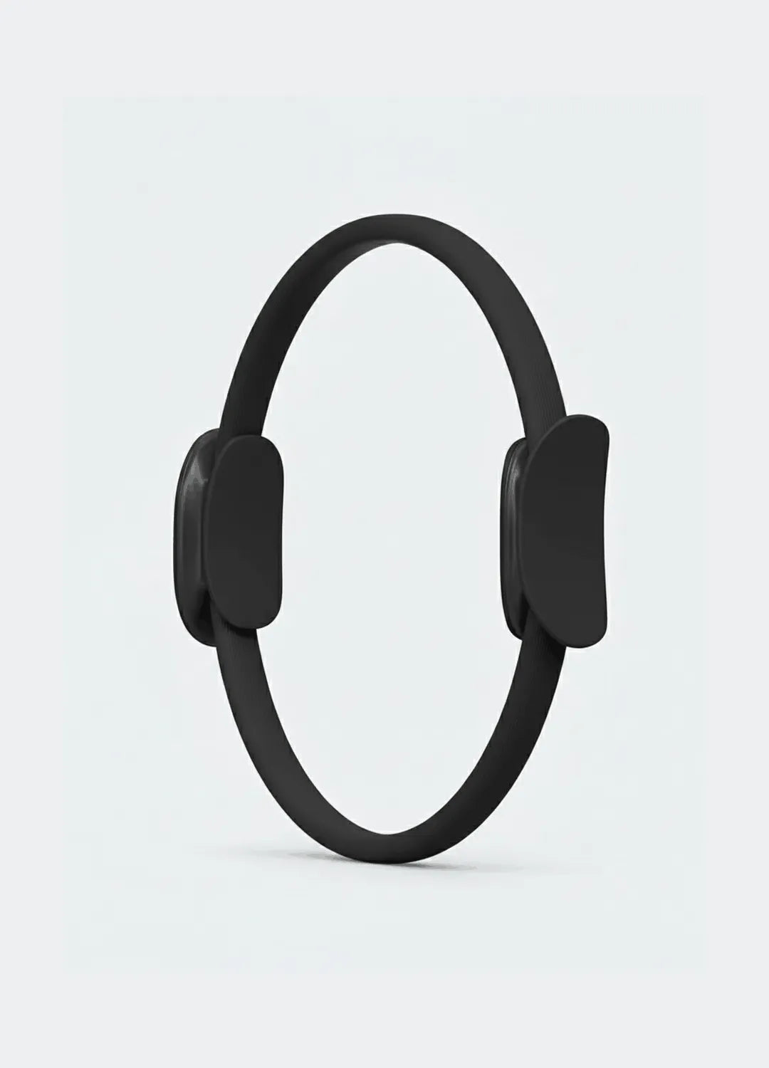 Anneau pilates noir fond gris clair