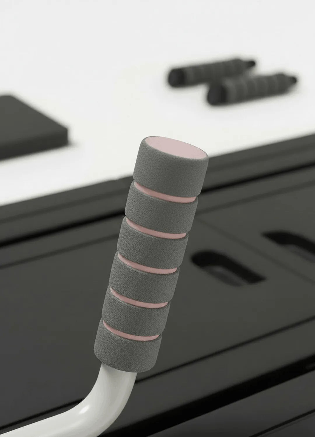 Détail poignées planche pilates noir